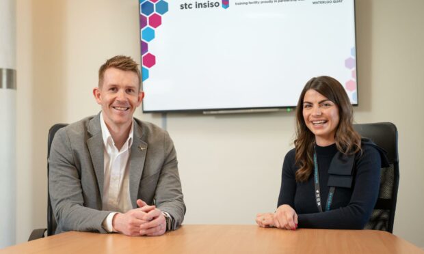 STC Insiso people change manager Craig Smith and Waterloo Quay Properties operations director Freya Winter.