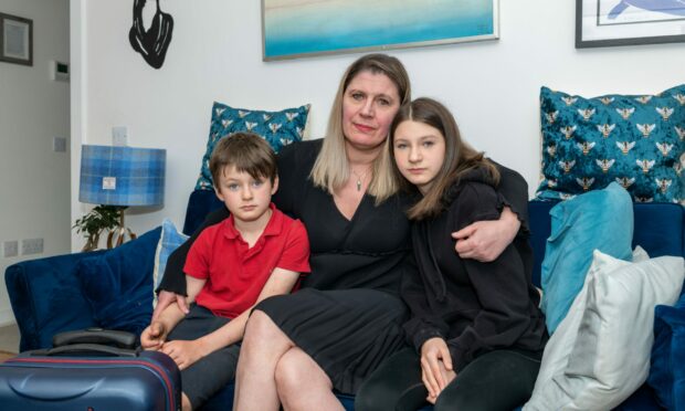 Julie Mackay with daughter Georgie and son Seb. Picture by Jasper Image.