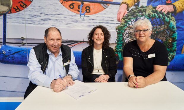 l-r Global Seafood Alliance chief executive Brian Perkins, rural affairs and islands cabinet secretary Mairi Gougeon and Seafood Scotland chief executive Donna Fordyce at Seafood Expo Global in Barcelona.