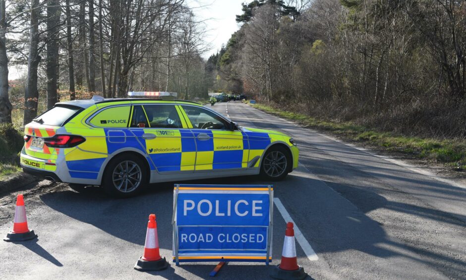 Police at the scene of a four-car crash between Banchory and Crathes in April 2022. 