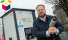Councillor Alex McLellan of the Aberdeen SNP Group at an electric vehicle EV charger. Photograph by Kath Flannery, 07/04/2022