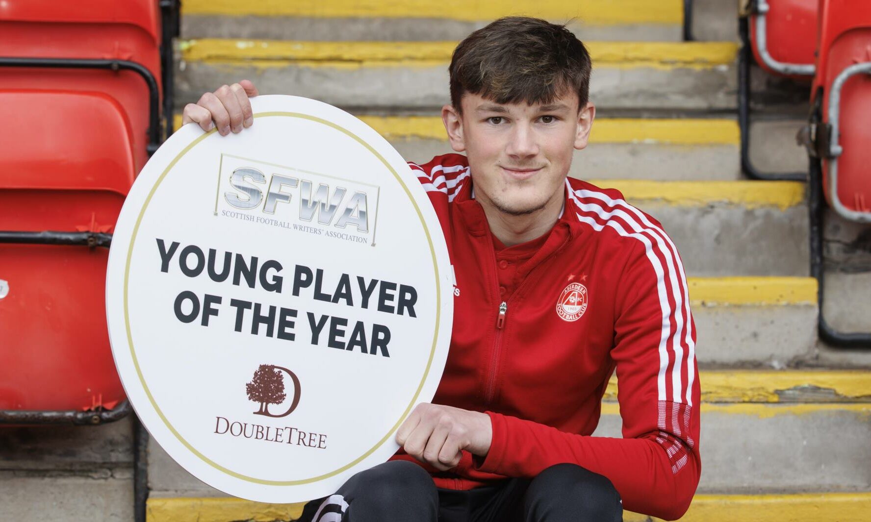 Calving Ramsay holds SFWA SPFL Young Player of the Year award.