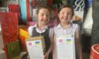 Lily and Lucy Christie from Ellon made up more than 100 care packages for Ukraine refugees.