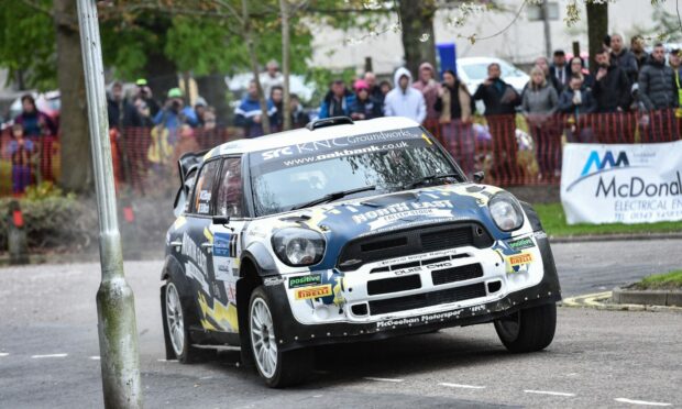 Many spectators lined the streets of Elgin to watch attend the popular event on Saturday. Picture by Jason Hedges