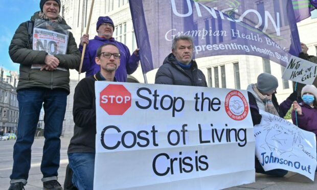 CR0034005
Aberdeen Trades Union Council is urging the citizens of North East Scotland to join their second protest against spiralling cost of living rises outside Marischal College, Aberdeen.

Picture by Kenny Elrick     05/03/2022