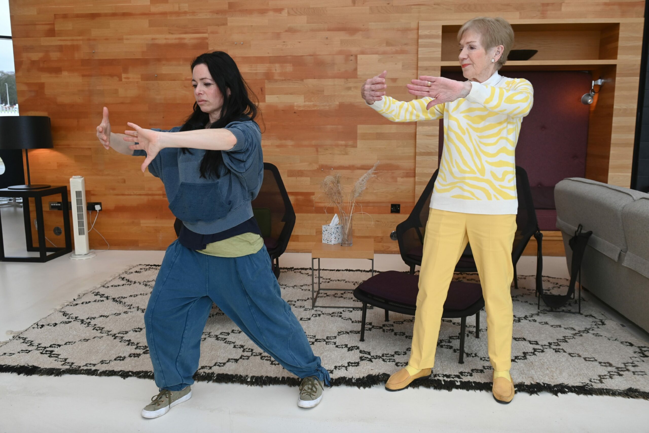 Margaret Donald practicing some Qigong moves with Tina Faulkner Elders at Maggie's Aberdeen. Picture by Kenny Elrick