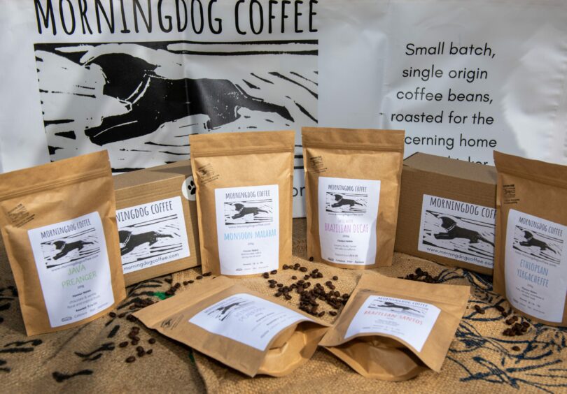 Morningdog Coffee types in brown paper bags with the Morningdog Coffee logo.
