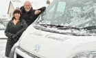 Sylvia and Del Elbeck with the new minibus bearing the name Lilian Cundall.