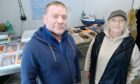 George and Jacqui Hosie stand in their Blue Sea fish merchants and processing site.