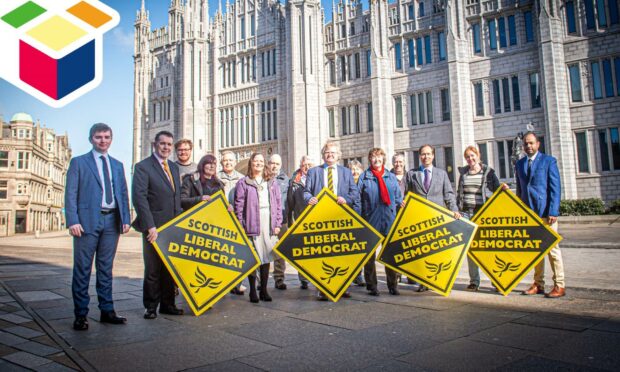 Aberdeen's Liberal Democrats have unveiled their manifesto ahead of next week's election. Pictured in Broad Street - where they want to ban buses - by Wullie Marr/DCT Media.