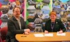 H2 Green managing director Luke Johnson and Highland Council leader Margaret Davidson seal the deal on a hydrogen "hub" in Inverness.