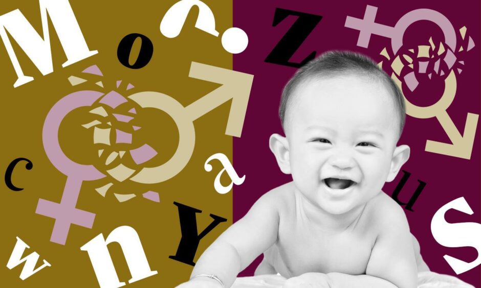 A baby surrounded by alphabet letters and gender symbols.