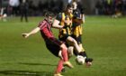 Fergus Alberts, right, in action for Huntly. Image: Paul Glendell/DC Thomson