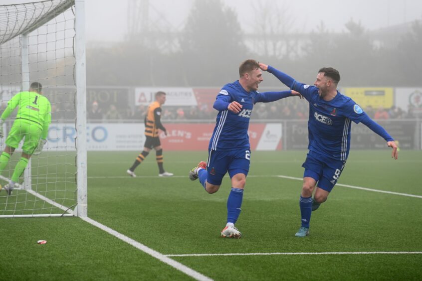 Fraser Fyvie celebrates his second goal with Cove Rangers team-mate Mitch Megginson