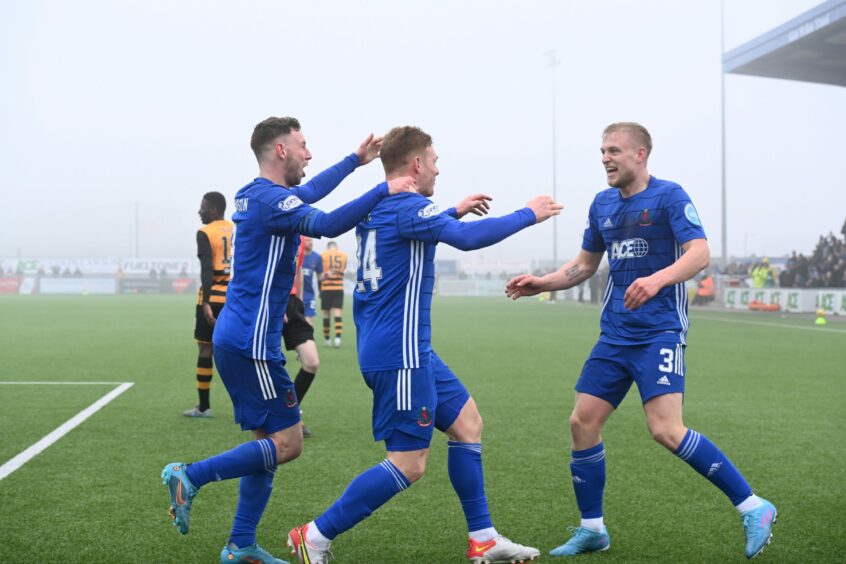 Harry Milne, right, is congratulated after scoring Cove's third against Alloa