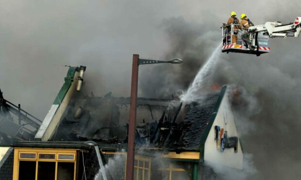 Firefighters worked for hours to deal with the serious blaze at Jimmy Chung's in Aberdeen in 2014.
