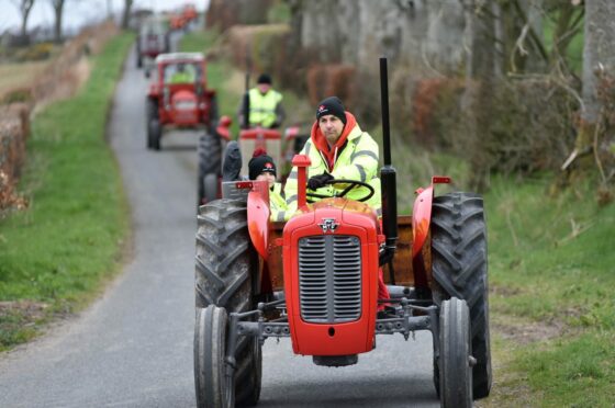 One last run: About 30 tractors took part in the last Buchan Vintage Tractor Run today. Picture: Duncan Brown