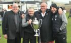 Fraserburgh manager Mark Cowie, second from left, with the Highland League championship trophy