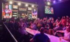 The Aberdeen crowd watches on as Peter Wright comes to the stage on Thursday night at the Premier League Darts