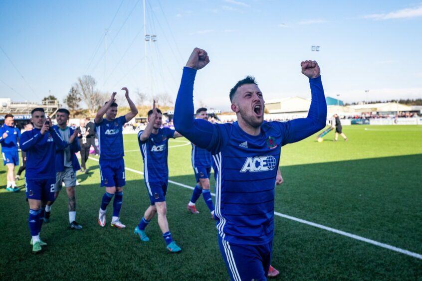Cove Rangers midfielder Connor Scully celebrates their title win