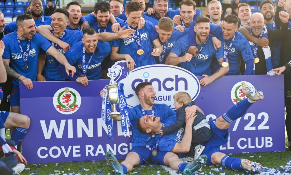 Fraser Fyvie and Mitch Megginson, front centre, celebrate Cove Rangers title triumph