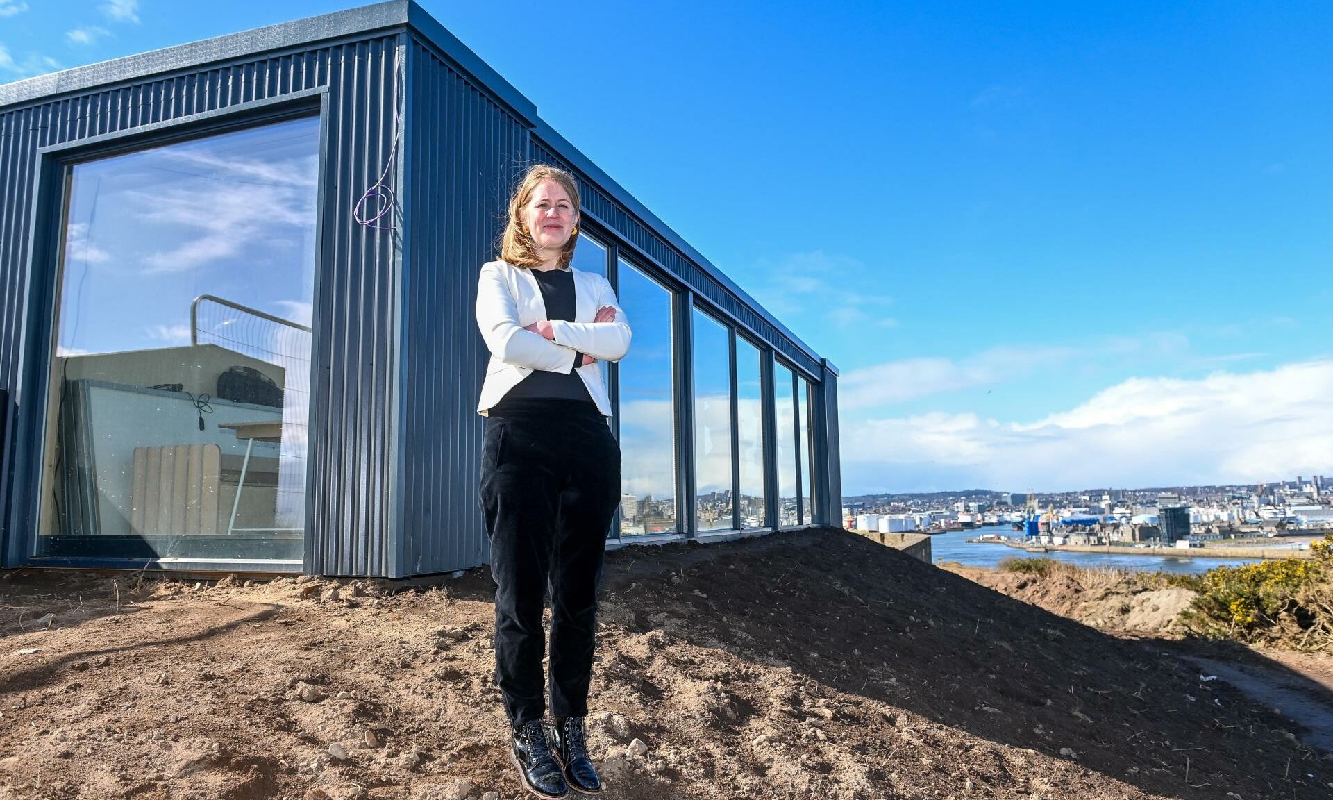 Fiona McIntyre standing in front of the new Greyhope Bay centre.
