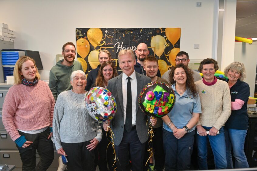 Gordon Young with several colleagues