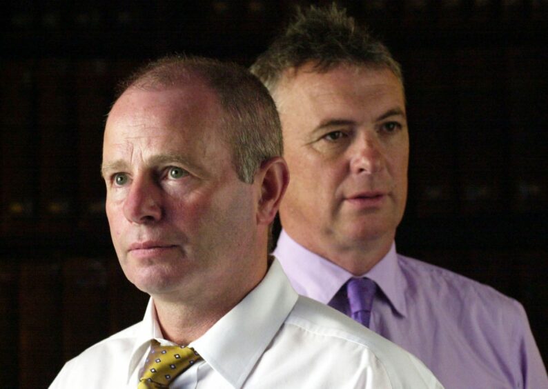 l to r: Stewart Milne and Glen Allison, the group's then managing director, in 2004.