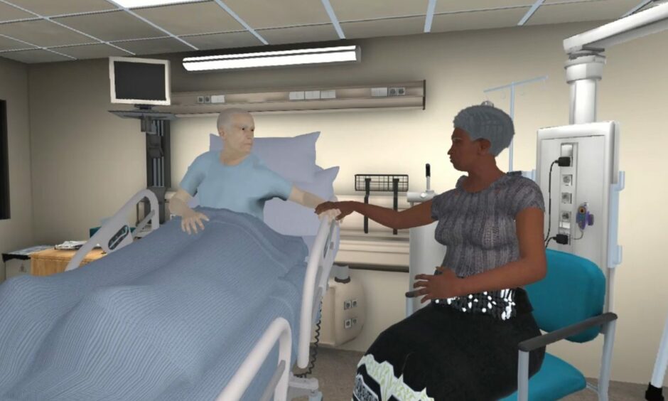 A screenshot of the virtual reality setting with the patient in a hospital bed and his wife sitting next to him.