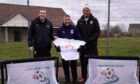 Caley Thistle sporting director John Robertson, centre, with Thurso Football Academy's Alyn Gunn, left, and Richie Campbell.