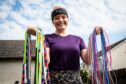 Tamsin Gray holding skipping ropes in both hands