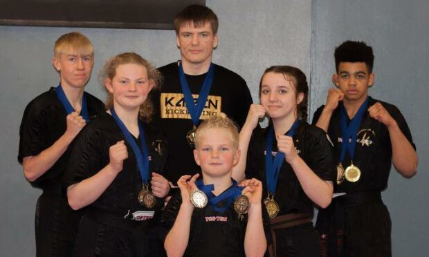 The seven Moray kickboxers chosen to take part in the World Championships.