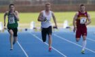 Ryan Oswald, left, running in the Scottish Championships 100m in 2012.