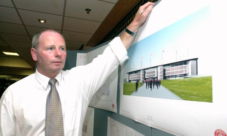 Former Dons chairman Stewart Milne with drawings of the plans for a new stadium near Kingswells - long before Kingsford. Picture by Colin Rennie/DCT Media.