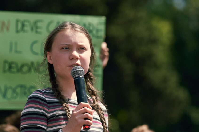 Climate campaigner Greta Thunberg speaking at a rally