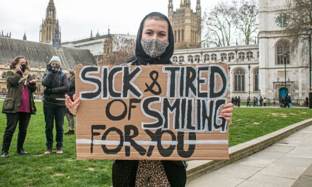 A protestor taking part in the 97 March in 2021, demanding safety on UK streets following the murder of Sarah Everard (Photo: Amer Ghazzal/Shutterstock)