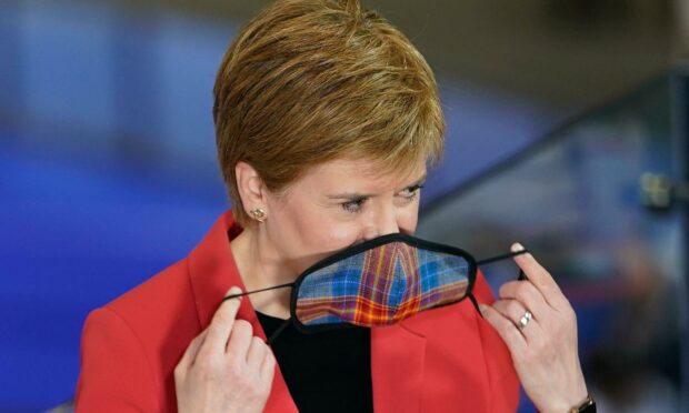 The Scottish Government still recommends wearing face masks in public places (Photo: Stuart Wallace/Shutterstock)