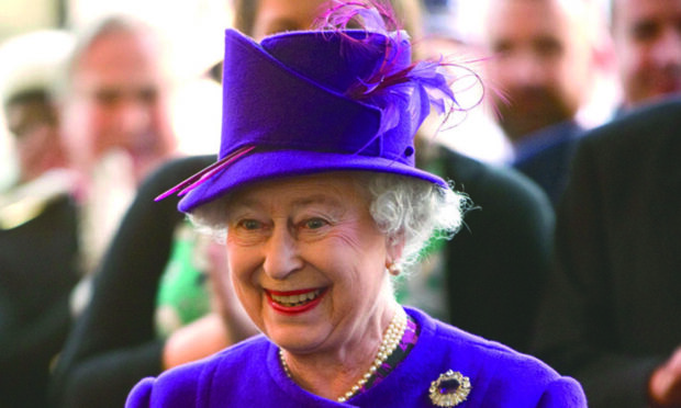 The Queen wore purple to visit a school in London in 2010.