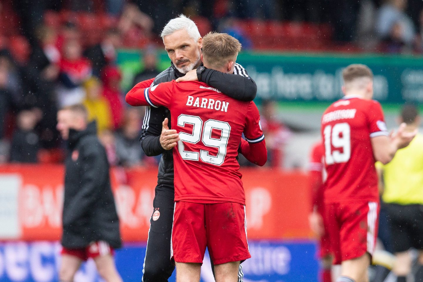 Aberdeen manager Jim Goodwin with Connor Barron