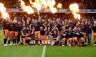 Edinburgh celebrate their treble haul at Murrayfield on Saturday.