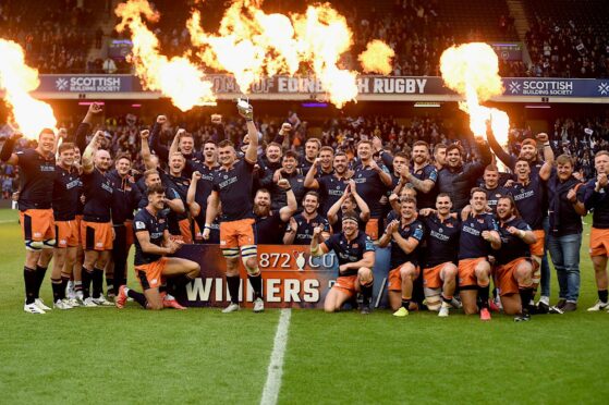 Edinburgh celebrate their treble haul at Murrayfield on Saturday.