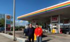 Shell boss in the North Sea Simon Roddy, with garage employee Jacob. Shell, North Anderson Drive. Supplied by Simon Roddy/Linkedin.