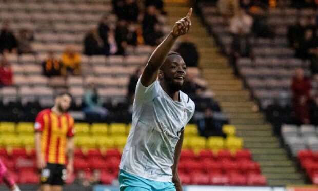 Austin Samuels celebrates his first leg winner for Caley Thistle at Partick Thistle on Tuesday.