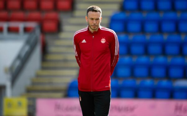 Aberdeen's Andy Considine was an unused substitute in the 1-0 loss at St Johnstone.