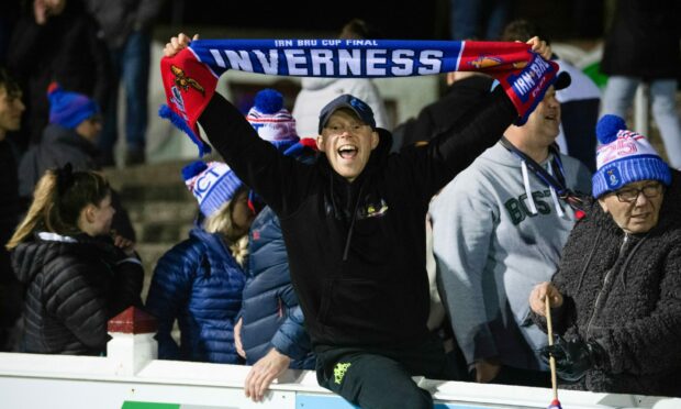 An Inverness fan celebrate after the semi-final shoot-out win at Arbroath.