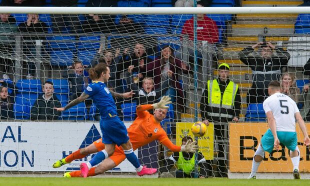 Stevie May fires St Johnstone in front against Inverness.