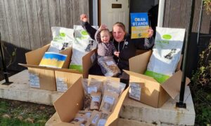 Alanna with her niece Amy with some of the many items the Oban Help Ukraine group have sent. Supplied by Shuna/Alanna Mackenzie.