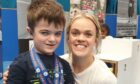 Lewis West with Olympian Ellie Simmonds at the National Dwarf Games.