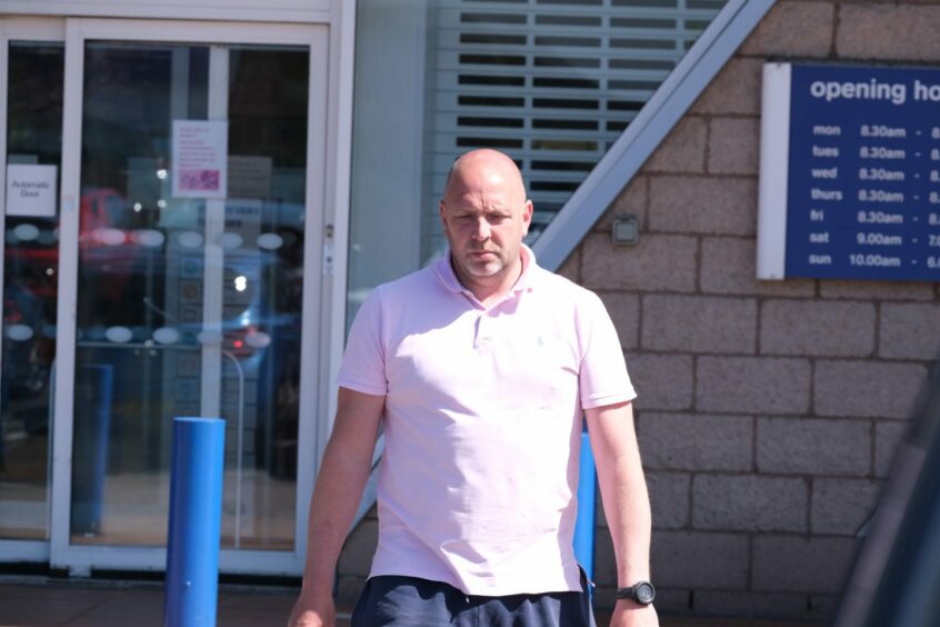 Ross Campbell spotted strolling in the sunshine outside Boots in the Garthdee area of Aberdeen.