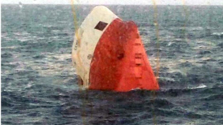 A picture of the cargo ship Cemfjord sinking